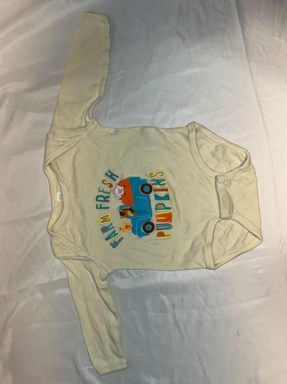 Rabbit Skins Cream Long Sleeve Bodysuit with Colorful Farm Truck Graphic